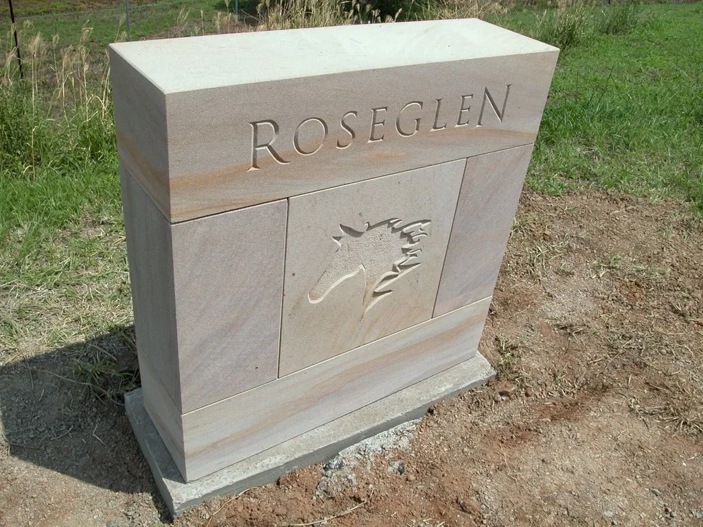 Roseglen logo carved sandstone logo sign