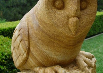 sandstone owl carving
